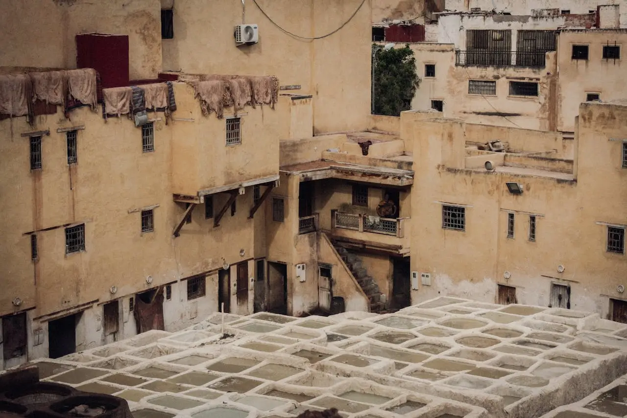 Old buildings surrounding a tanning area