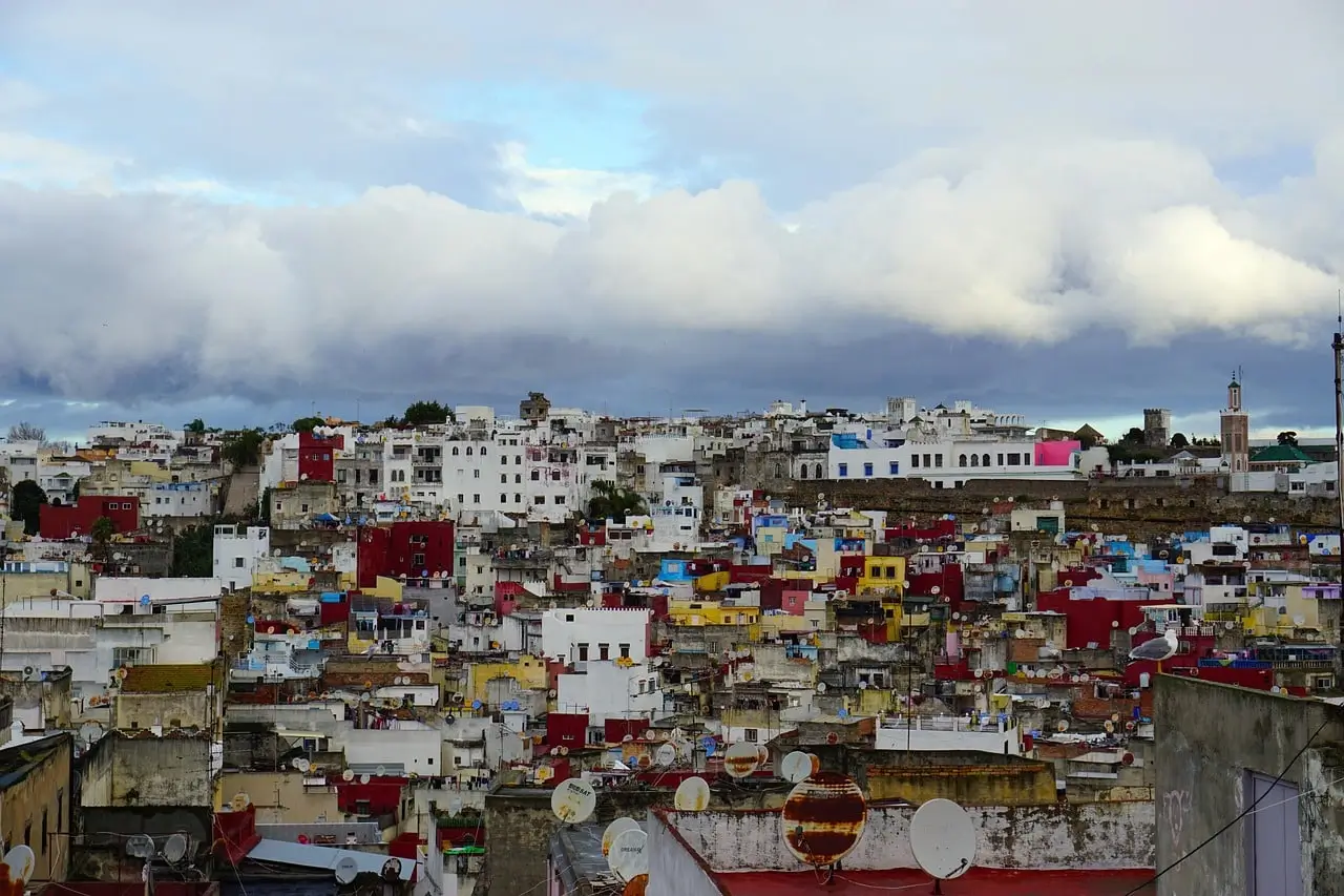 Colorful rooftops under cloudy sky